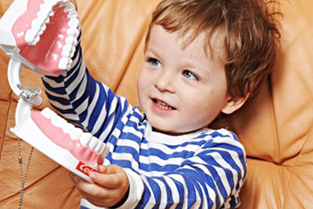 Ред Ребёнку леч зуб